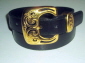 Black karung snakeskin belt large gold colour buckle.