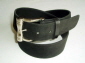 Black suede belt with silver colour buckle.