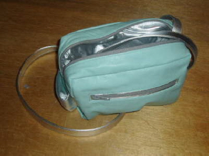 Silver leather bag ready to turn