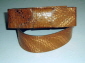 Tan copper bow belt.