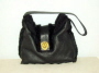 Black sheepskin bag with lion trim �35